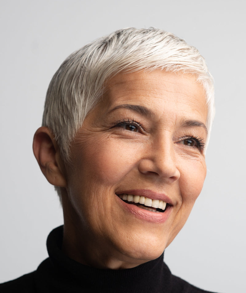 Woman with short silver hair